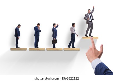 Career ladder concept with businessman - Shutterstock ID 1562822122