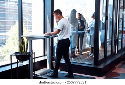 Career man, phone call and walking on treadmill for talking, fitness or health as speaker in modern office. Male person, mobile and working with paperwork, communication or company for investor deal - Powered by Shutterstock