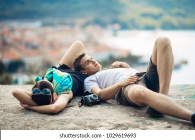 Carefree Couple Relaxing,looking At The Cityscape View.Making A Company.Stress Free,freedom Feeling.Happiness And Mindfulness.Serene Relationship.Soul Mates.Best Friends Hanging Out.Deep Conversation