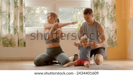 Carefree loving family adult dad, mom and little child. Shared activity aims to instill love for sports and physical activity within the family. Creates cherished memories in childhood and parenthood.