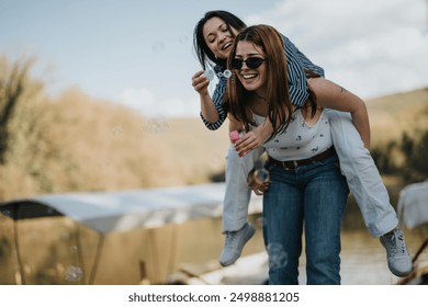 Carefree moments captured as two friends have fun outdoors, blowing bubbles and enjoying a joyous day by a serene lake. - Powered by Shutterstock