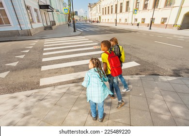 Careful Children Crossing Street