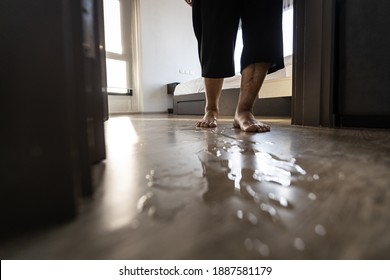 Careful Of Slippage,danger,accident,asian Senior Woman Is Stepping On The Wet Floor,water Spills,old People Walking On Wet Area,risk Of Slip And Fall,concept Of Prevention And Care Of The Elderly Safe