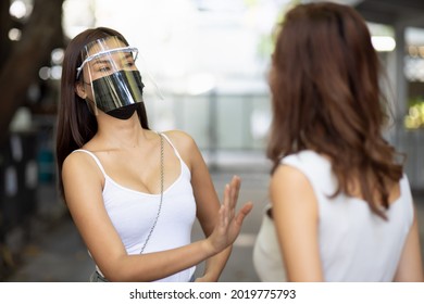 Careful Woman With Face Mask Asking No Masker To Stay Away