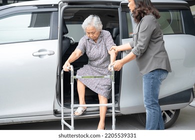 Caregiver Daughter Help And Support Asian Senior Or Elderly Old Lady Woman Patient Prepare Get Out Her Car.