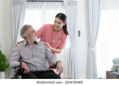 Caregiver for an elderly man Weekly check-ups at the patient's residence. Ready to give medical advice and talk about various stories, exchange each other happily. - Shutterstock ID 2254783405