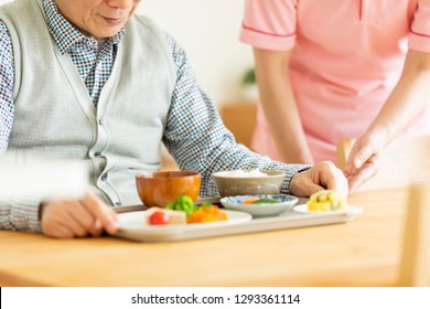 A Caregiver Preparing Meals