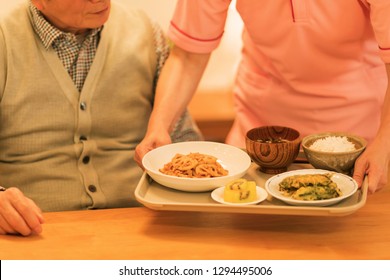 A Caregiver Preparing Meals