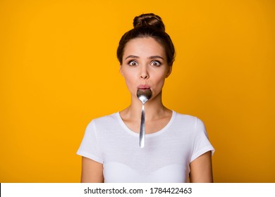 Careless funny dream dreamy girl hold lips spoon kitchen cutlery utensils want joking while waiting for delicious tasty yummy meal wear white t-shirt isolated bright shine color background