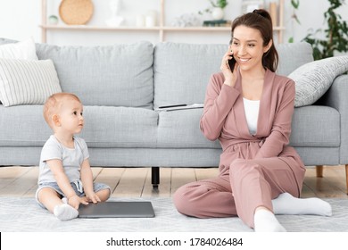 Careless Mom. Young Mother Talking On Cellphone At Home And Ignoring Her Baby Son, Free Space