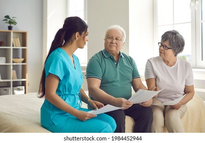 Caretaker Helps Senior Patients Sign Homecare Agreement, Fill Informed Exam Consent, Understand Test Result Or Health Insurance Details. Grandparents Discuss Professional Home Care Nurse Service Costs