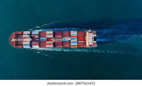 cargo container ship fully loaded transportaion colorful shipping containers navigates through deep blue ocean waters, leaving a wake as it transports goods global maritime logistics international trade.