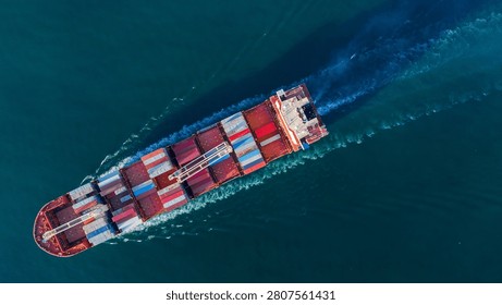 cargo container ship fully loaded transportaion colorful shipping containers navigates through deep blue ocean waters, leaving a wake as it transports goods global maritime logistics international trade.