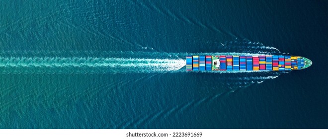 Cargo container Ship, cargo maritime ship with contrail in the ocean ship carrying container and running for export  concept technology freight shipping sea freight by Express Ship. top view  - Shutterstock ID 2223691669