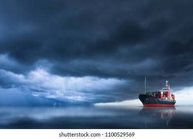 Cargo Container Ship Sailing In The Ocean With Storm Sky .