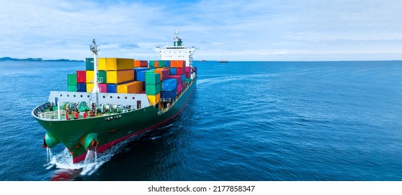 cargo container ship sea freight carrying container and running for export goods from cargo yard port to custom ocean concept technology transportation , customs clearance. logistics supply front view - Shutterstock ID 2177858347