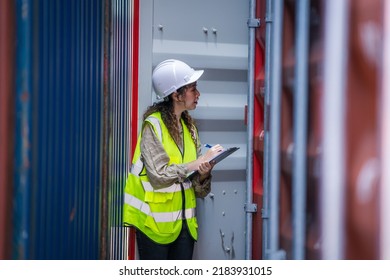 Cargo container worker working in the container yard warehouse.