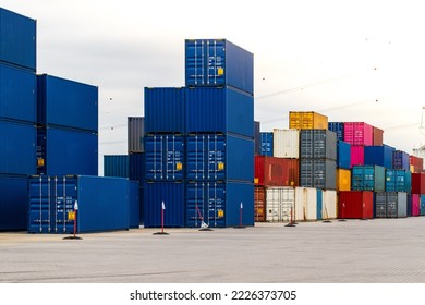Cargo containers. Cargo container yard. Stack of freight containers at the docks. Industrial yard. Import and export logistic concept.