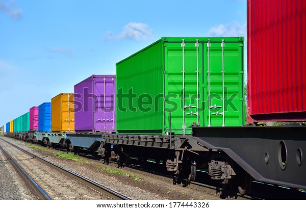 Cargo Containers\
Transportation On Freight Train By Railway. Intermodal Container On\
Train Car. Rail Freight Shipping Logistics Concept. Import - export\
goods from Сhina.