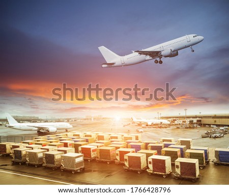 Cargo containers waiting load into an airliner