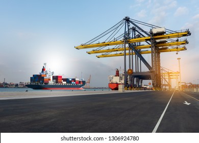 Cargo Crane In The International Yard Port For Loading Big Tank From Ship To Truck Concept Logistic Container Depot Shipping By Sea , Smart Logistic Service And Transportation..