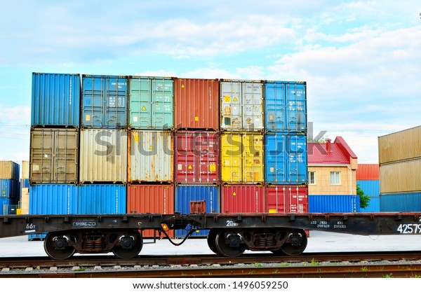 Cargo dock terminal with sea containers. logistic\
warehouse port of shipping container for the subsequent sorting,\
loading and sending them on freight railway cars or trucks to the\
client - Image