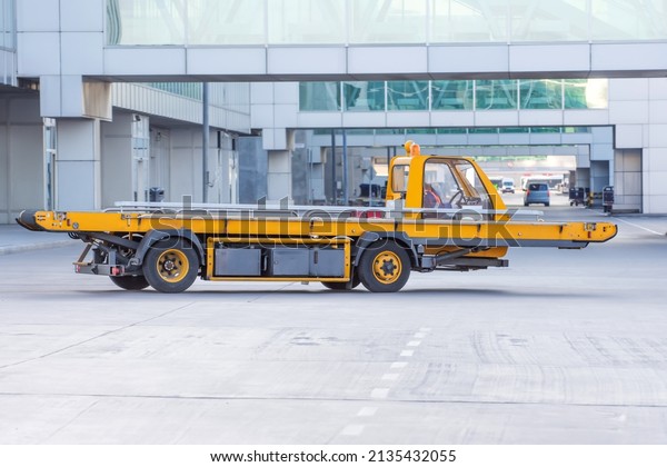 Cargo\
equipment car loader for luggage in the airport\
hub