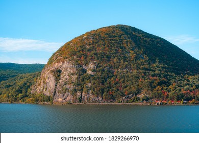 Cargo Freight Train At The Base Of Storm King Mountain In The Lower Hudson River Valley, As Seen From The Breakneck Ridge Hiking Trail