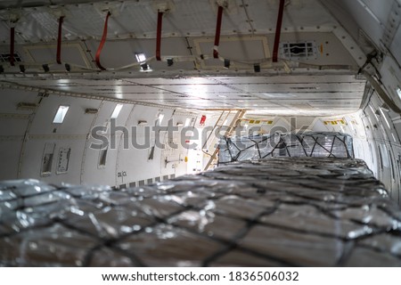 Cargo inside main deck of aircraft