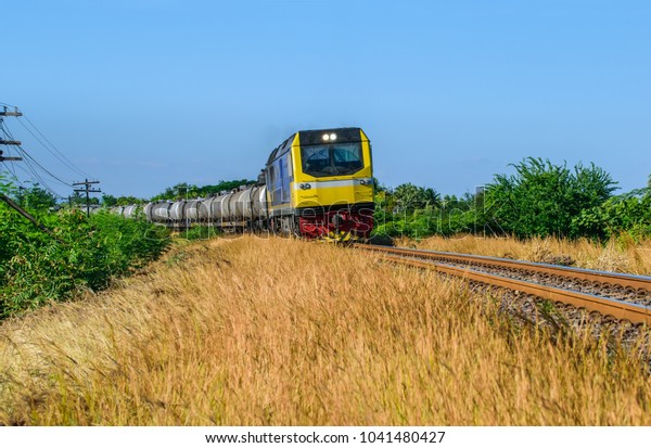 Cargo railway shipping industry and freight\
railroad transportation industrial.Railroad train of tanker cars\
transporting oil on the\
tracks.