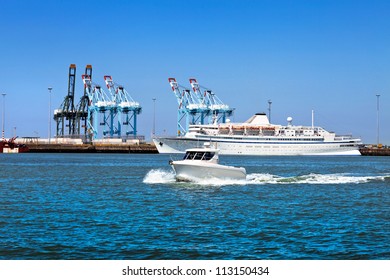 Cargo sea port. Cargo cranes. Ship and boat.