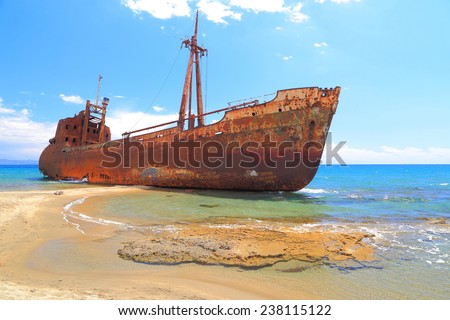Cargo ship covered with rust on a beach near Gythio, Greece