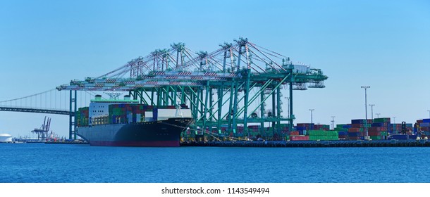Cargo Ship And Cranes At The Port Of Long Beach, Los Angeles, California