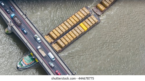 Cargo Ship Crossing Thames River.