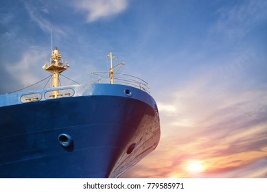 Cargo Ship Forward Close Up On Blue Sky Background