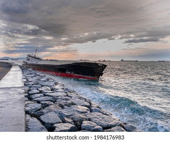 Cargo Ship Grounding After Storm
