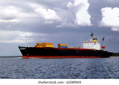 Cargo Ship Is Leaving Port Sailing Away