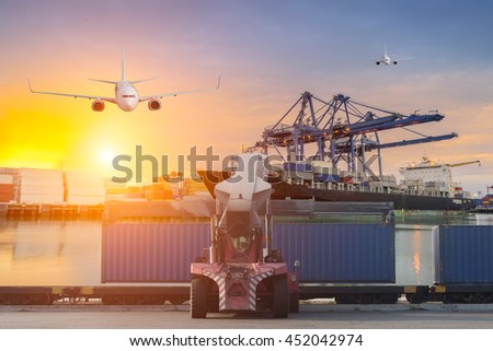 Cargo ship loading containers at sunshine