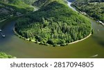 Cargo Ship Navigating the Saar Loop (Saarschleife) in Saarland, Germany