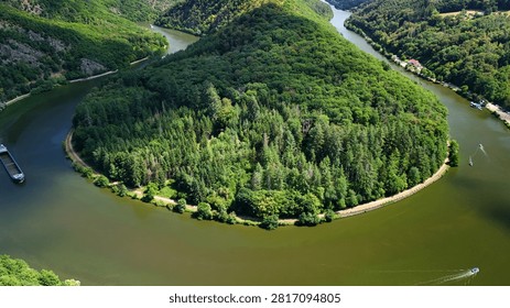 Cargo Ship Navigating the Saar Loop (Saarschleife) in Saarland, Germany