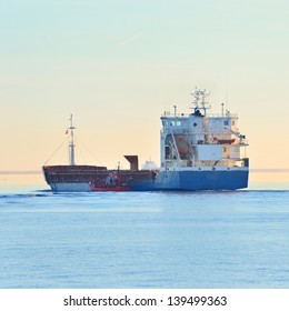 Cargo Ship Sailing Away