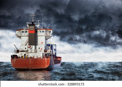 Cargo Ship At Sea During A Storm.