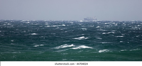 Cargo Ship In Storming Sea