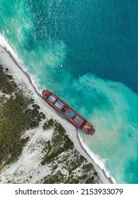 A Cargo Ship Stranded After A Storm, Top View