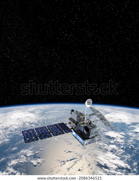 Cargo space craft 3D illustration Earth planet.Dark\
background. Sci-fi wallpaper.Space Station Orbiting Earth.Space\
ship. Space art wallpaper.Solar Observatory.Elements of this image\
furnished by NASA
