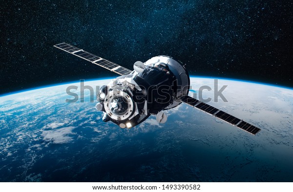貨物宇宙船と地球惑星 暗い背景 Sf壁紙 Nasaが提供するこの画像のエレメント の写真素材 今すぐ編集