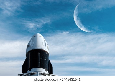 Cargo spacecraft launch on sky background with Moon. Elements of this image furnished by NASA. - Powered by Shutterstock