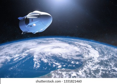 Cargo spacecraft in low-Earth orbit. Elements of this image furnished by NASA.