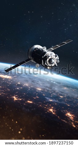 Cargo spaceship on orbit of Earth planet. Space vertical wallpaper. View from space station. Elements of this image furnished by NASA.