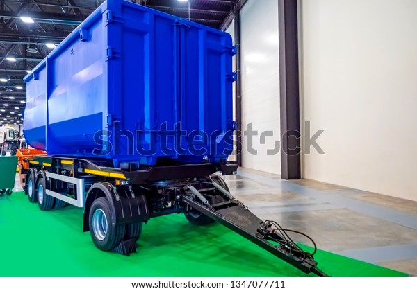 Cargo trailer. Metal container for garbage\
disposal. Dumpster on wheels. Trailer for scrap metal. Secondary\
raw materials. Garbage\
removal.